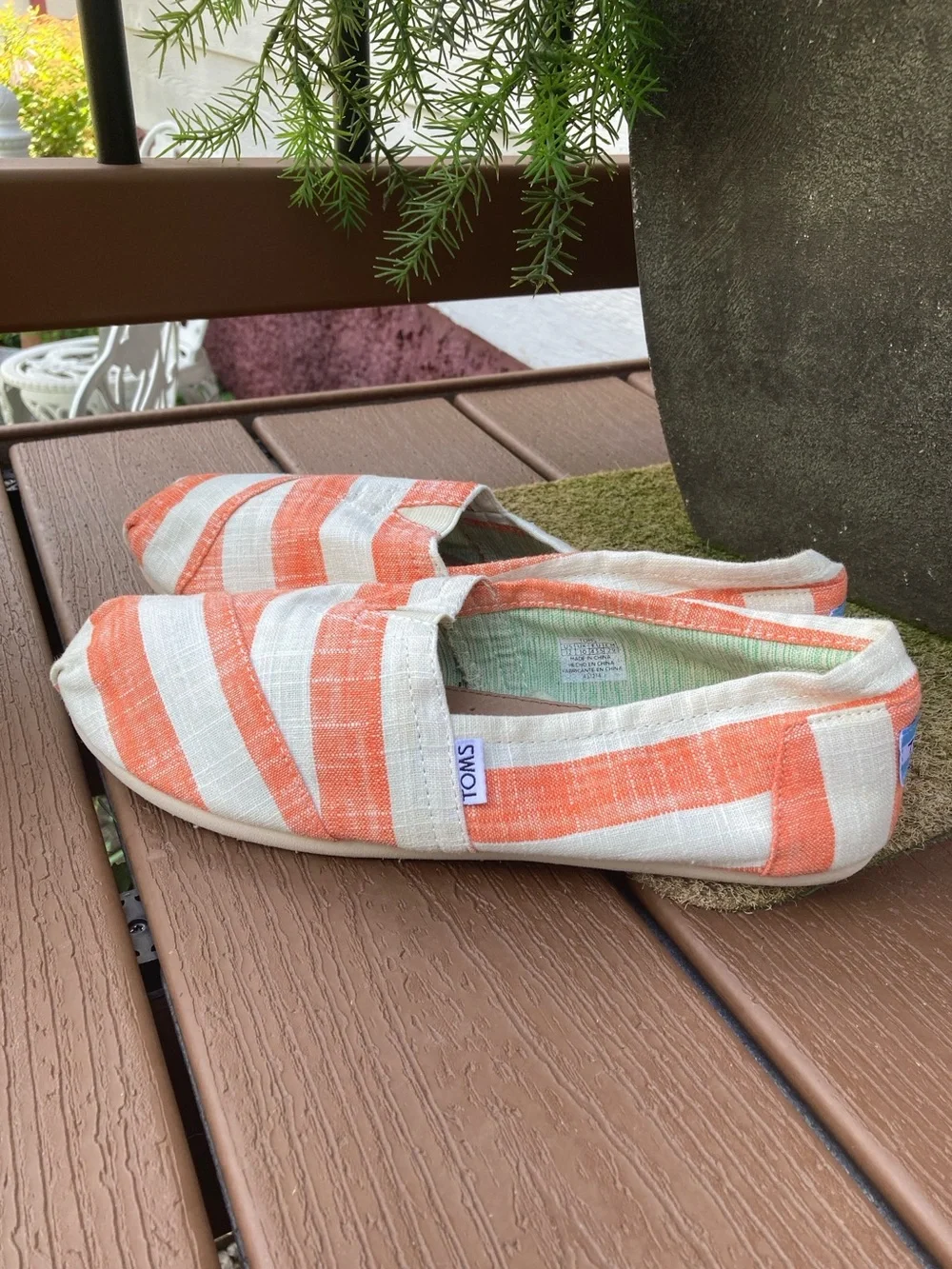 Tom’s size 12 Classic Coral White stripe slip on shoes